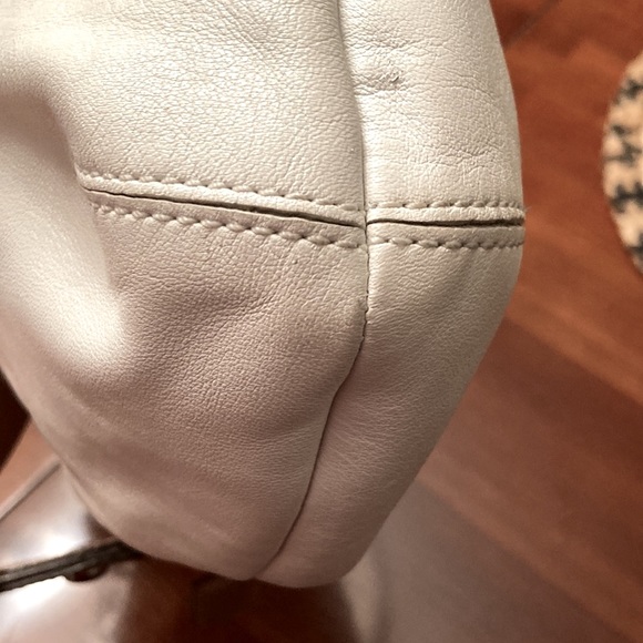 COACH PURSE. Bone colored with tan trim. Pleated. Back slip pocket. Clean inside - Picture 7 of 10